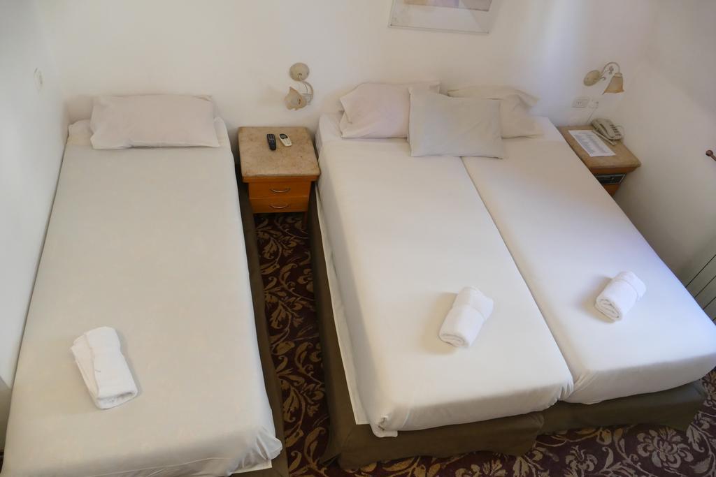Quarto Triplo Superior com Varanda