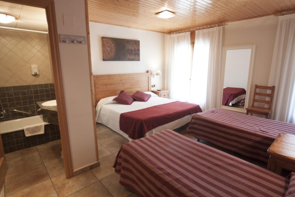 Habitación Cuádruple (2 adultos + 2 niños)