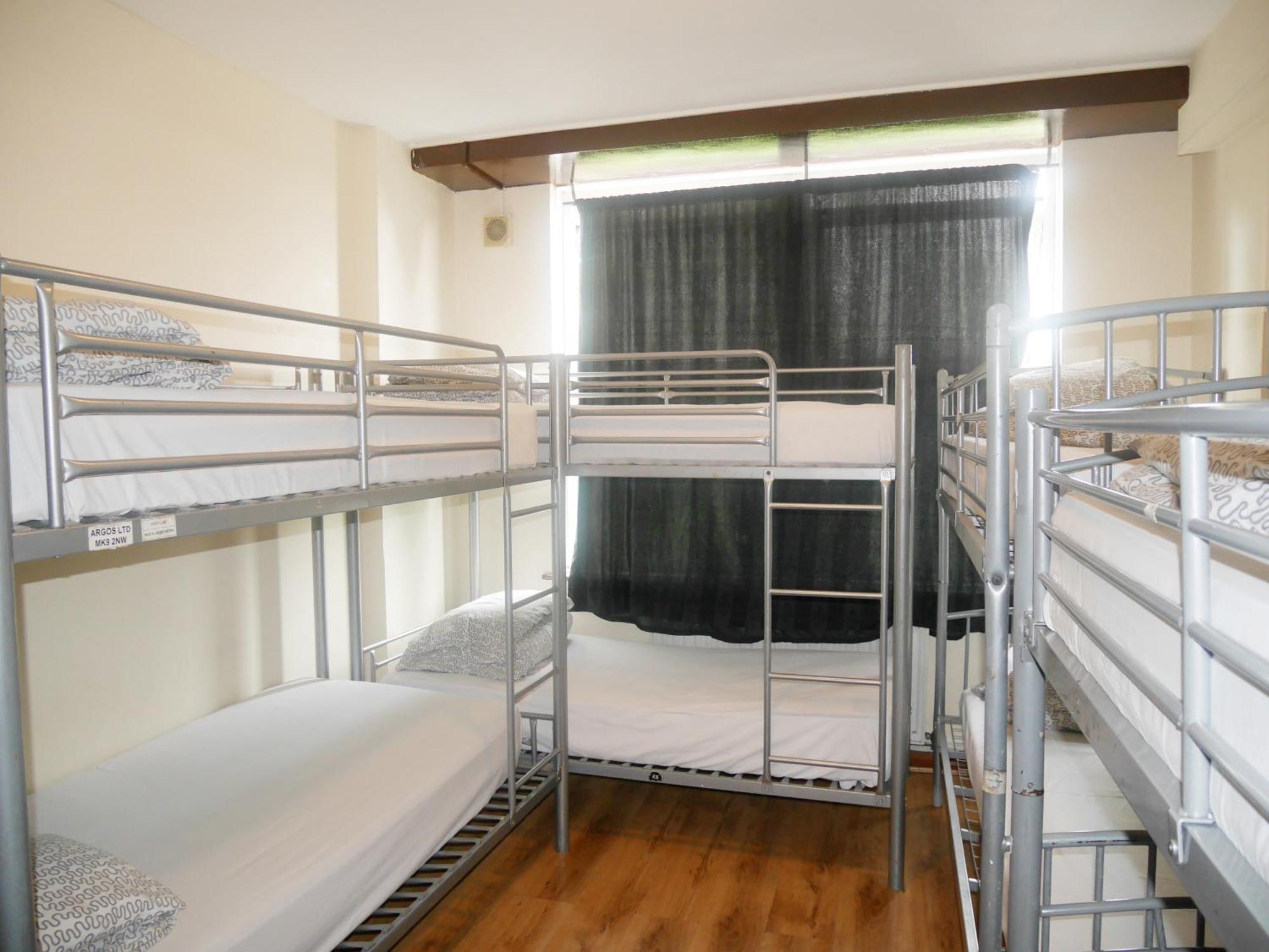 Cama en habitación compartida mixta de 8 camas