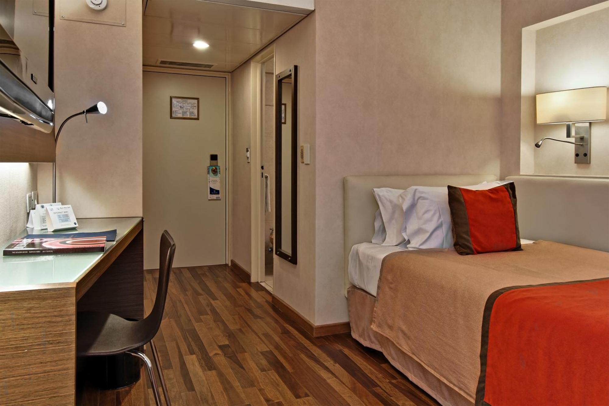 Quarto Triplo Executivo