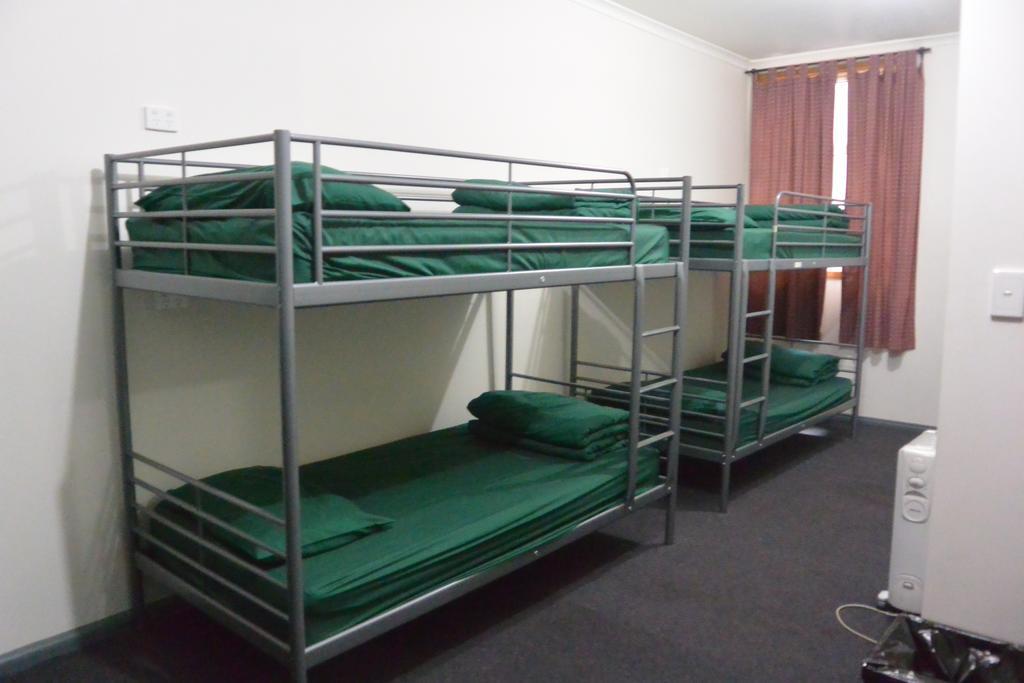 Posto letto in Dormitorio Misto da 4 Letti con Bagno in Comune