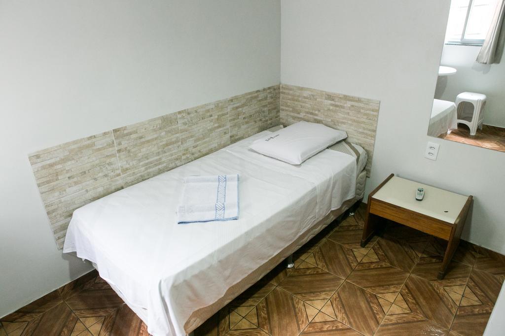 Quarto Individual Standard com Banheiro Compartilhado
