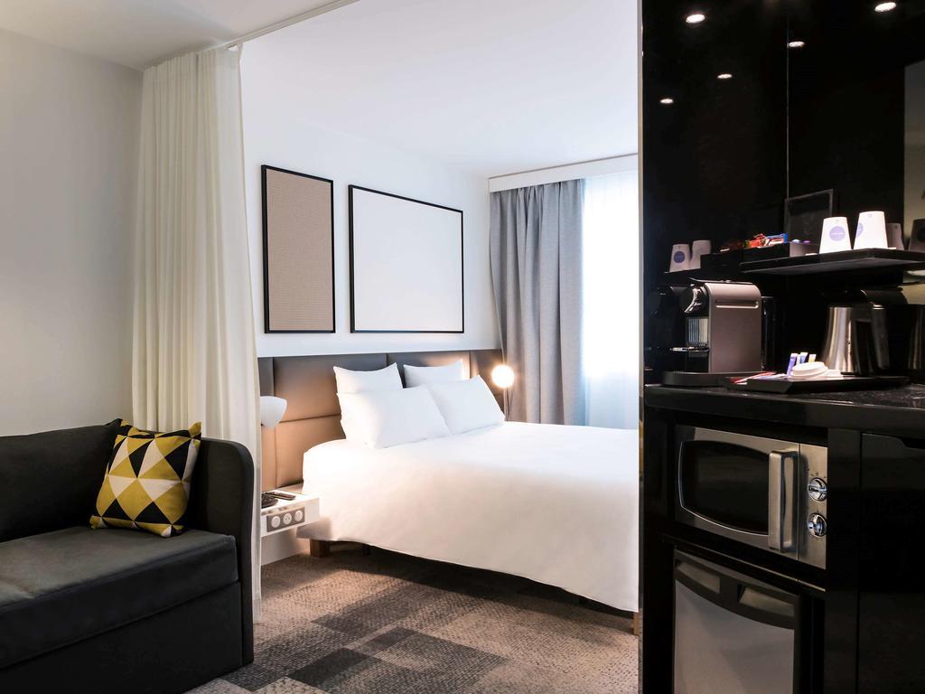 Executive Suite mit Queensize-Bett und Sofa