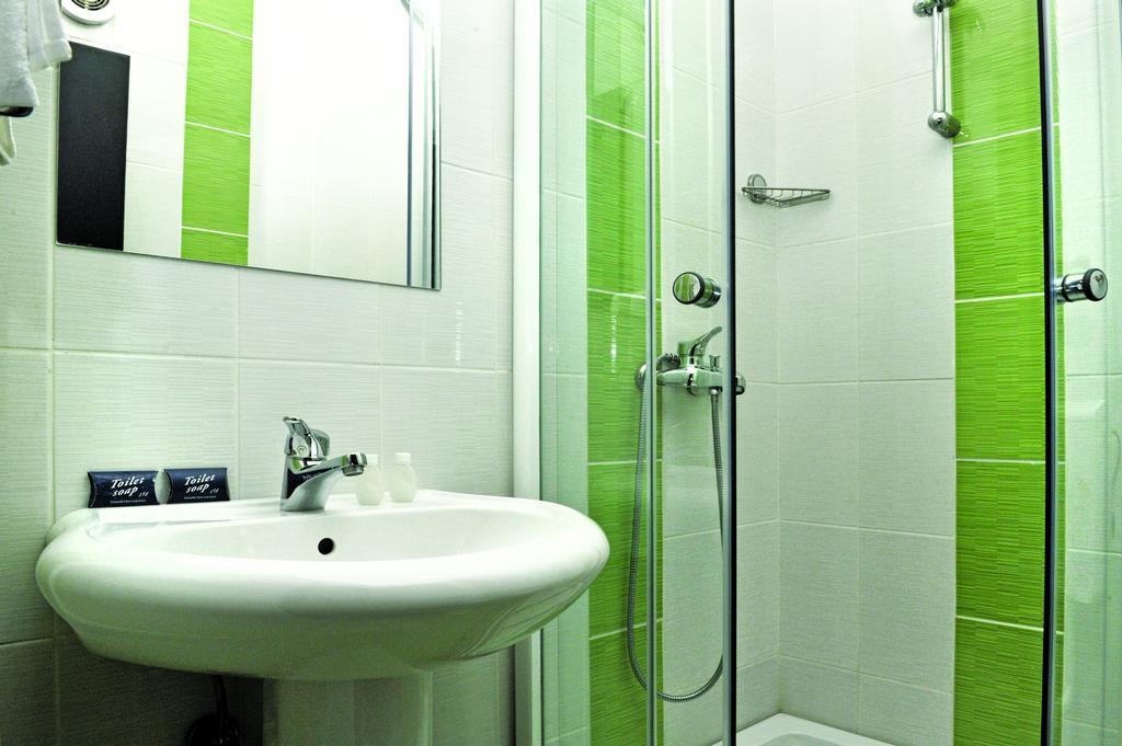 Comfort Tweepersoonskamer met 1 of 2 Bedden - Begane Grond