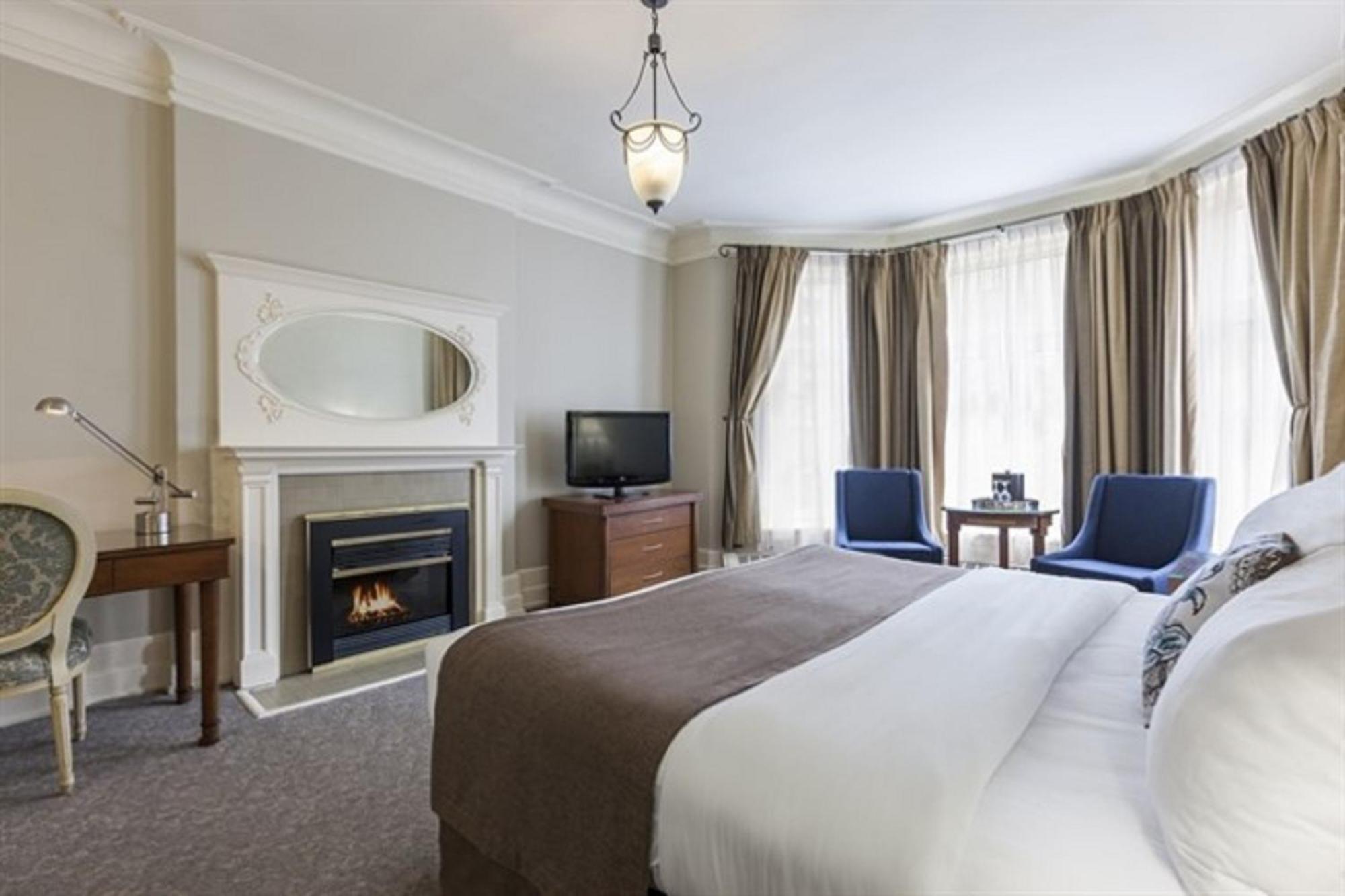 Chambre Lit King-Size Deluxe avec Cheminée