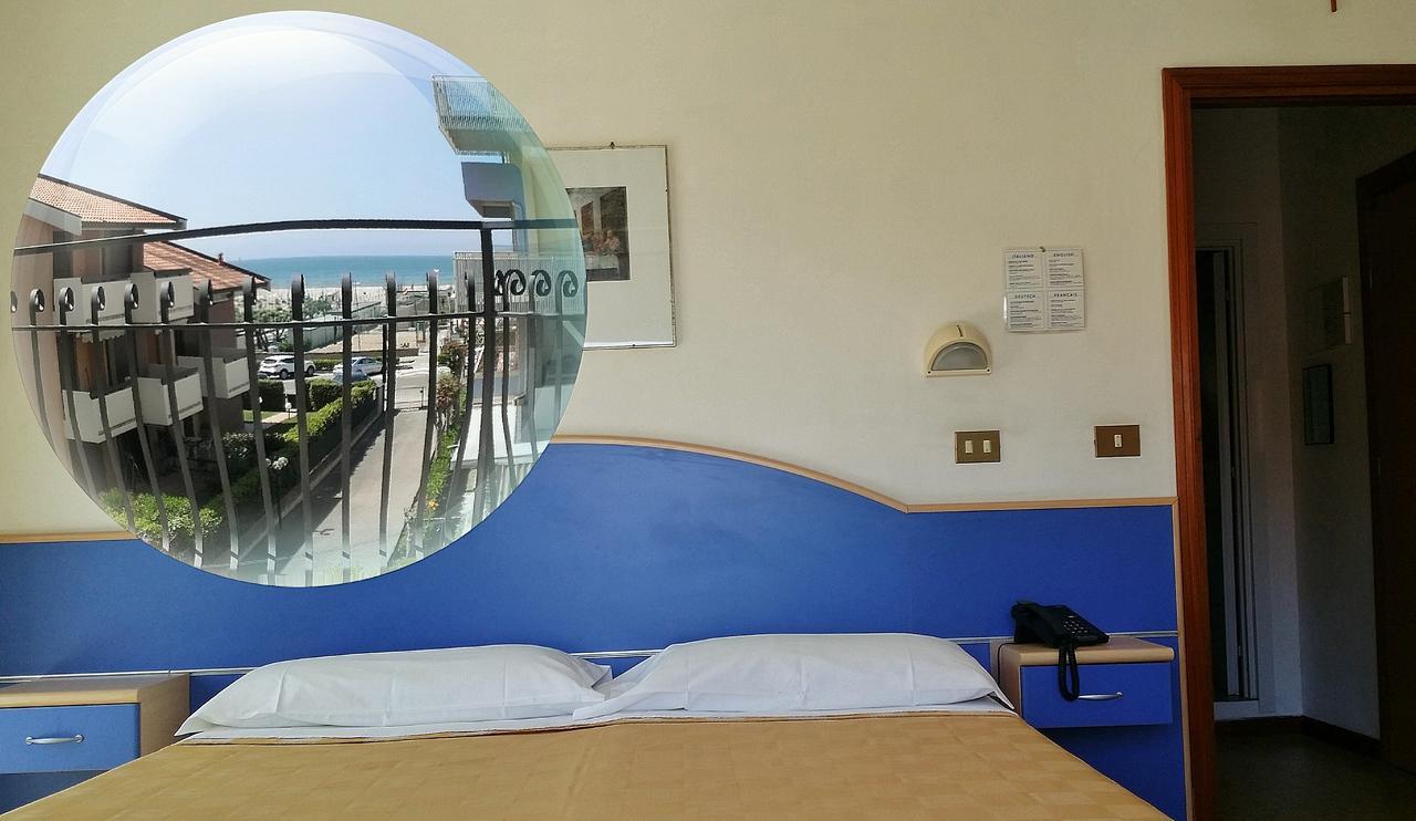 Camera Tripla con Balcone