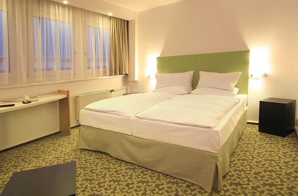 Standaardsuite met 1 Tweepersoonsbed en 2 Banken
