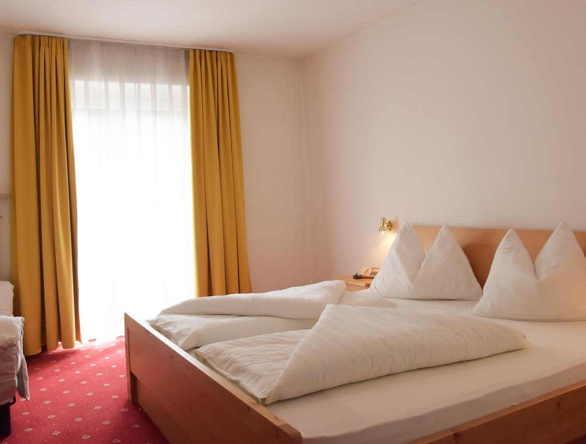 Dreibettzimmer mit Balkon