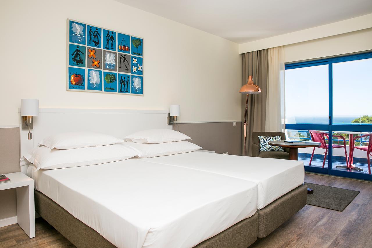 Habitación Doble Deluxe con cama supletoria y vistas al mar