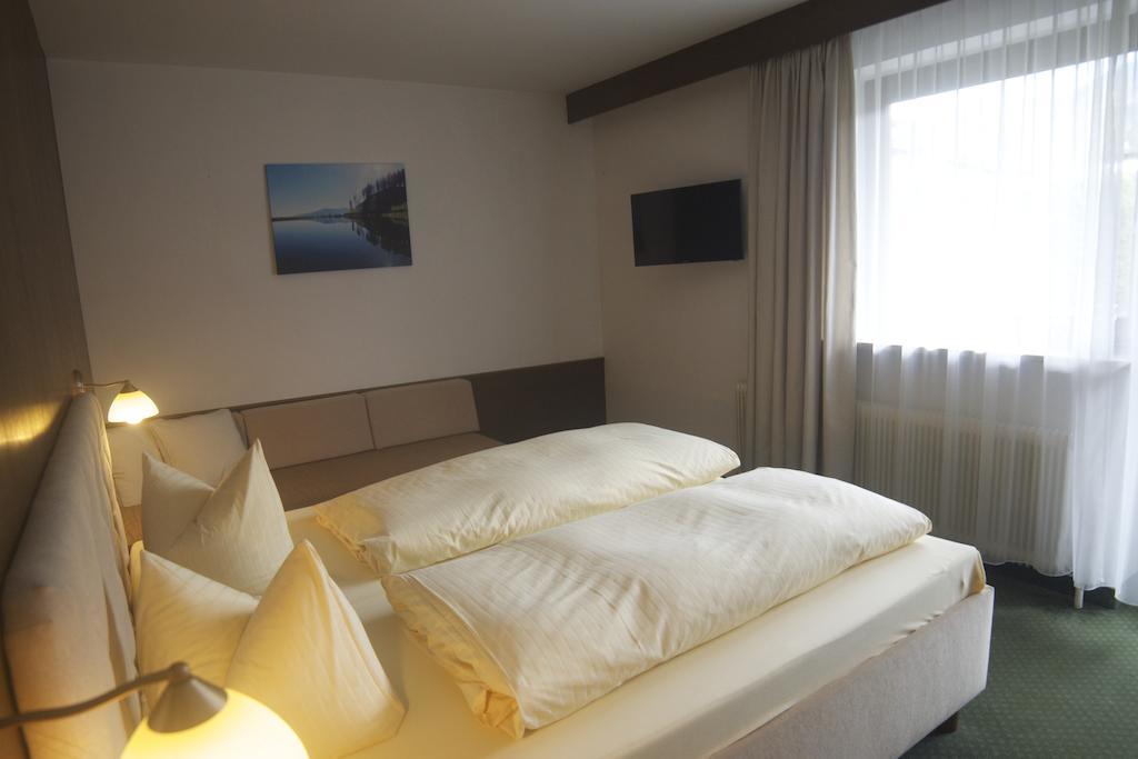 Dreibettzimmer mit Balkon