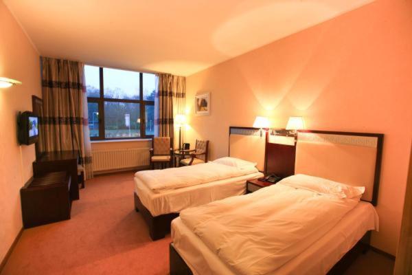 Doppel- oder Zweibettzimmer