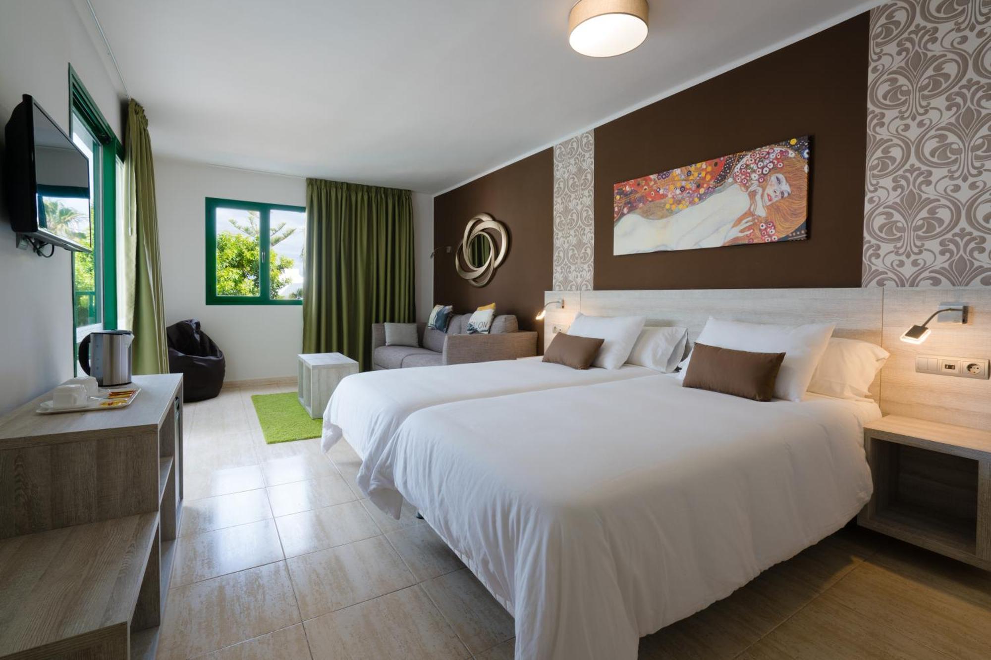 Suite 2 Chambres (2 Adultes + 1 Enfant)