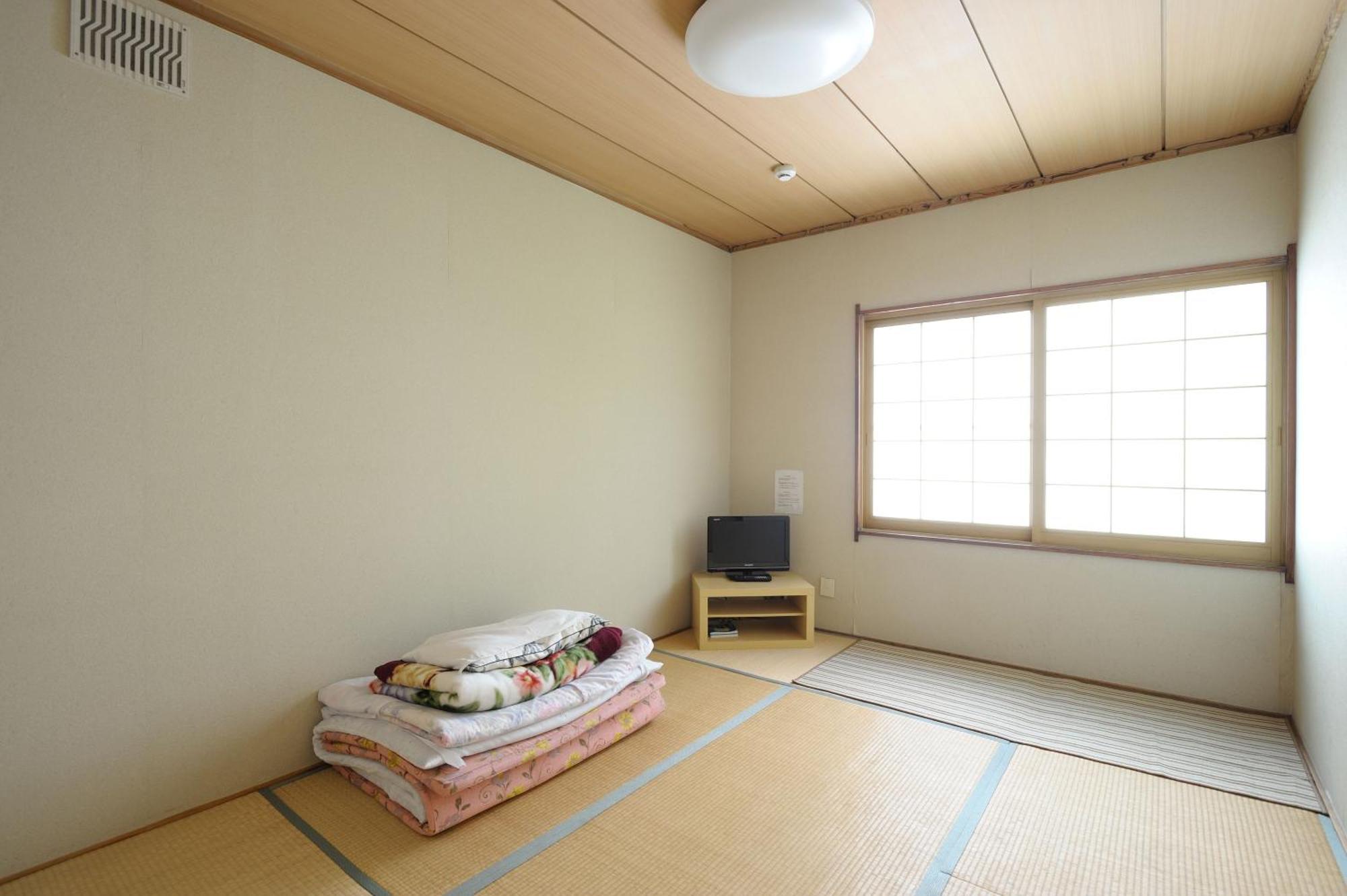 Single Room with Shared Shower and Toilet