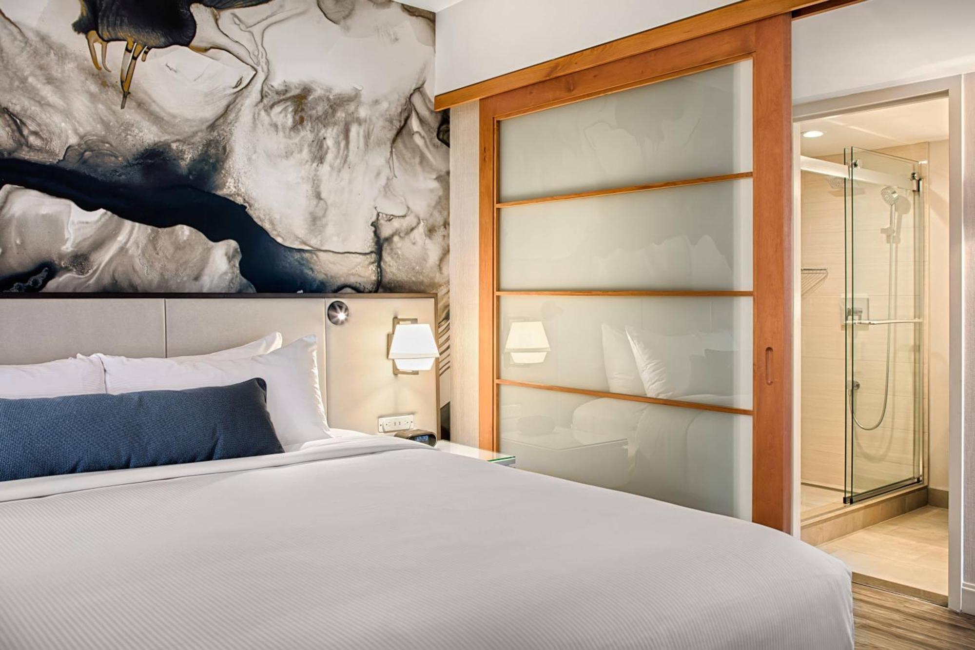Suite Urban con cocina, sofá cama y vista a la ciudad - Cama extragrande