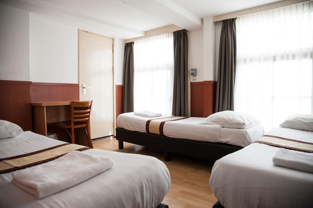 Chambre Triple avec Salle de Bains Commune