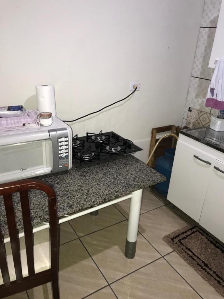 Quarto Triplo Básico com Banheiro Compartilhado