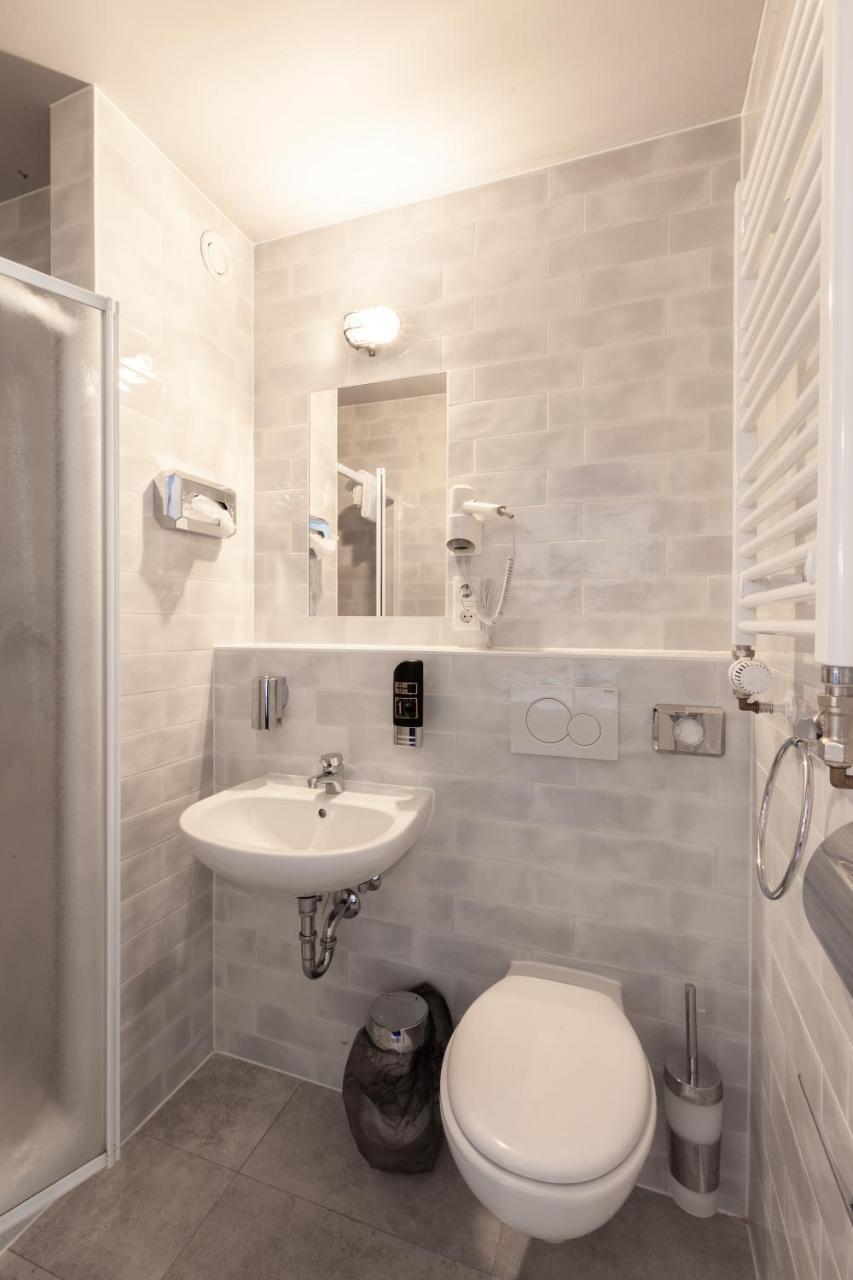 Kamer met twee aparte bedden voor eenpersoonsgebruik