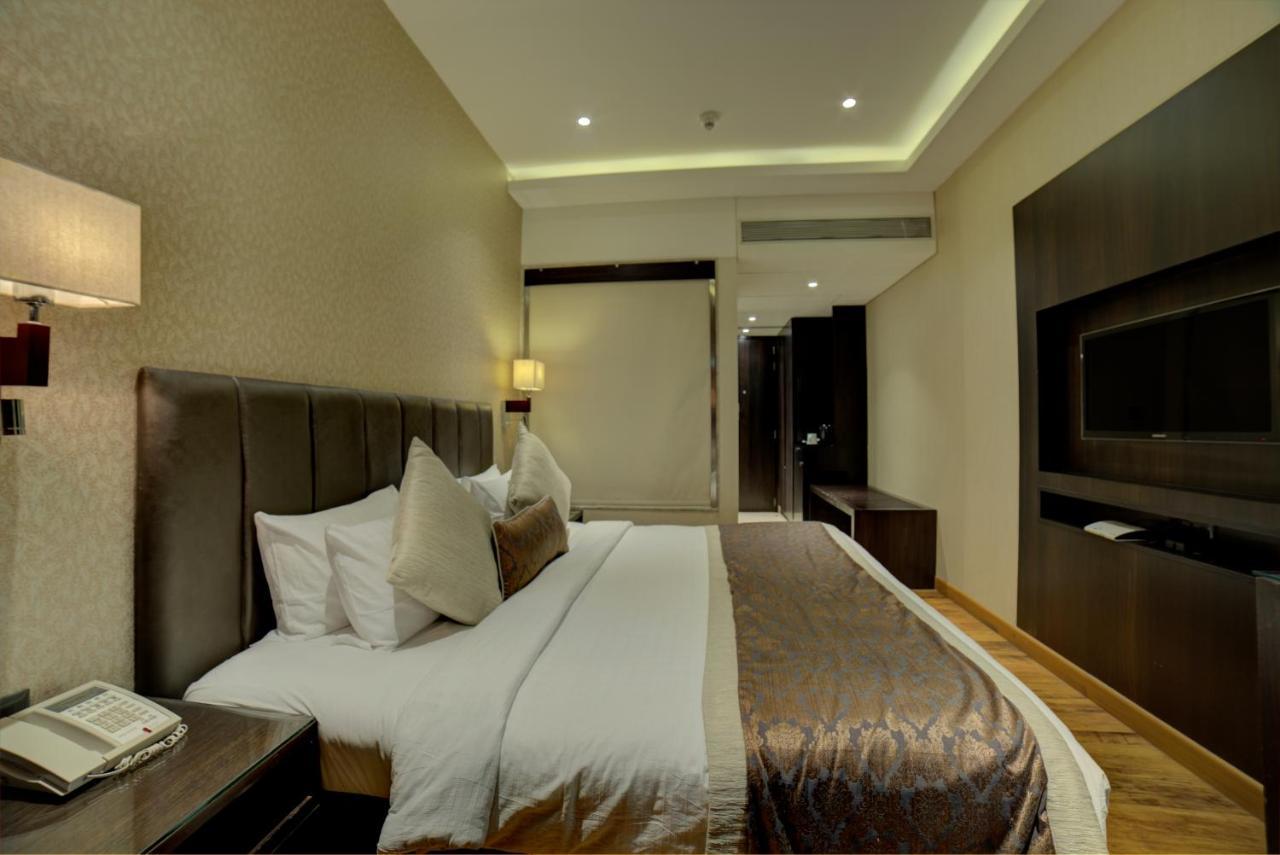 Chambre Exécutive Lit Queen-Size