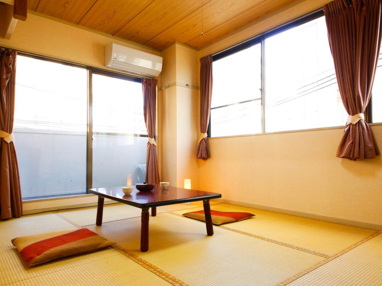 Chambre Quadruple avec Salle de Bains Privative