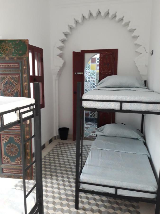Cama en habitación compartida de 6 camas