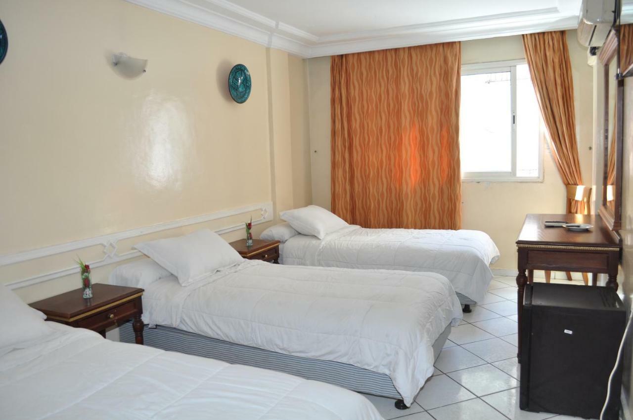 Chambre Triple - Vue sur Ville
