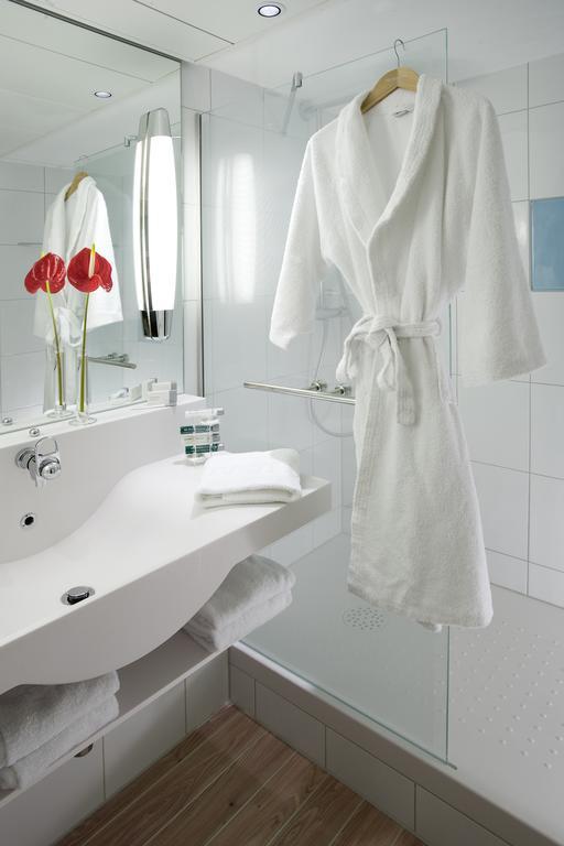 Quarto Executivo com 1 Cama Queen-size e Sofá