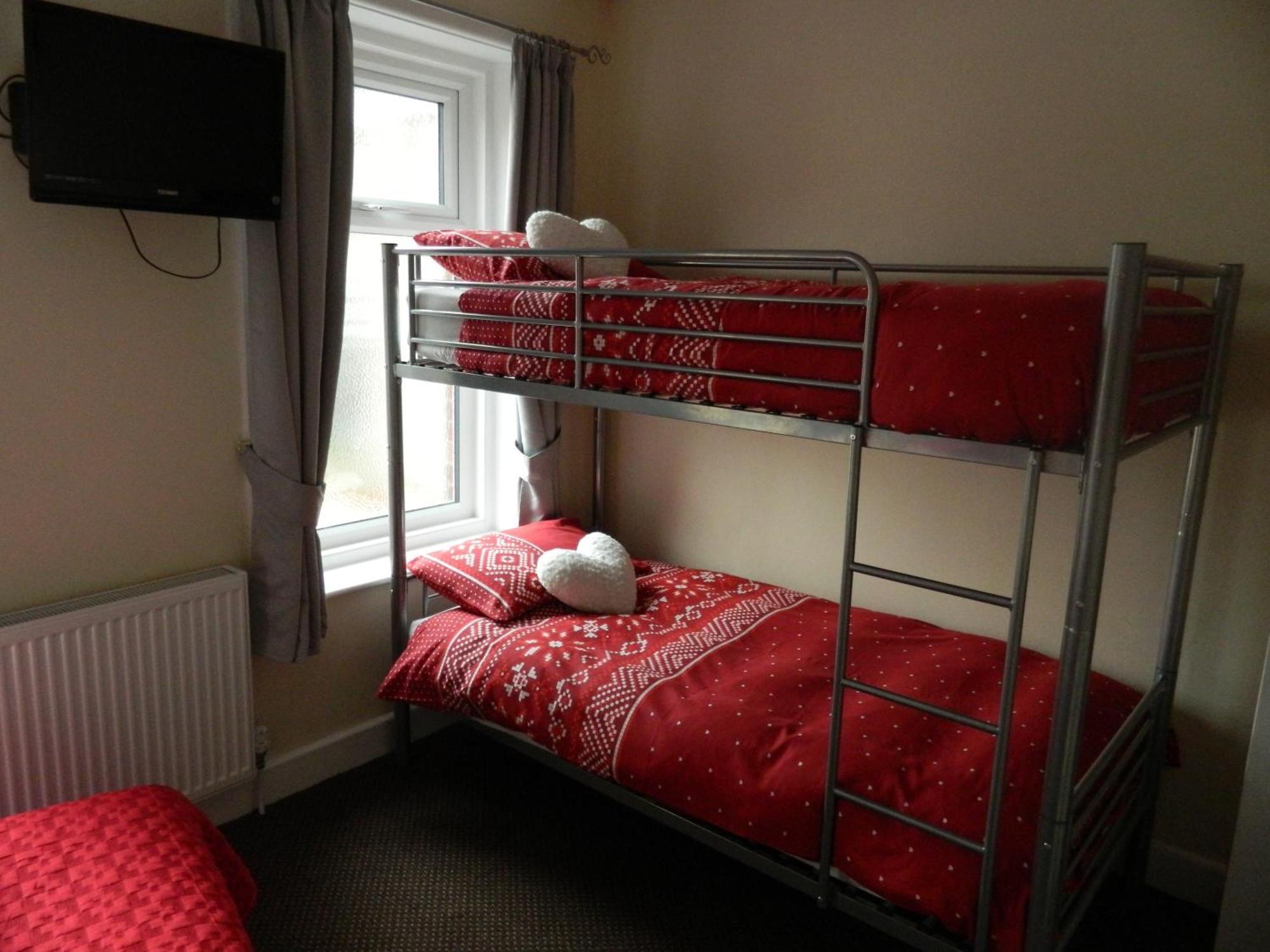 Familienzimmer (2 Erwachsene + 2 Kinder)
