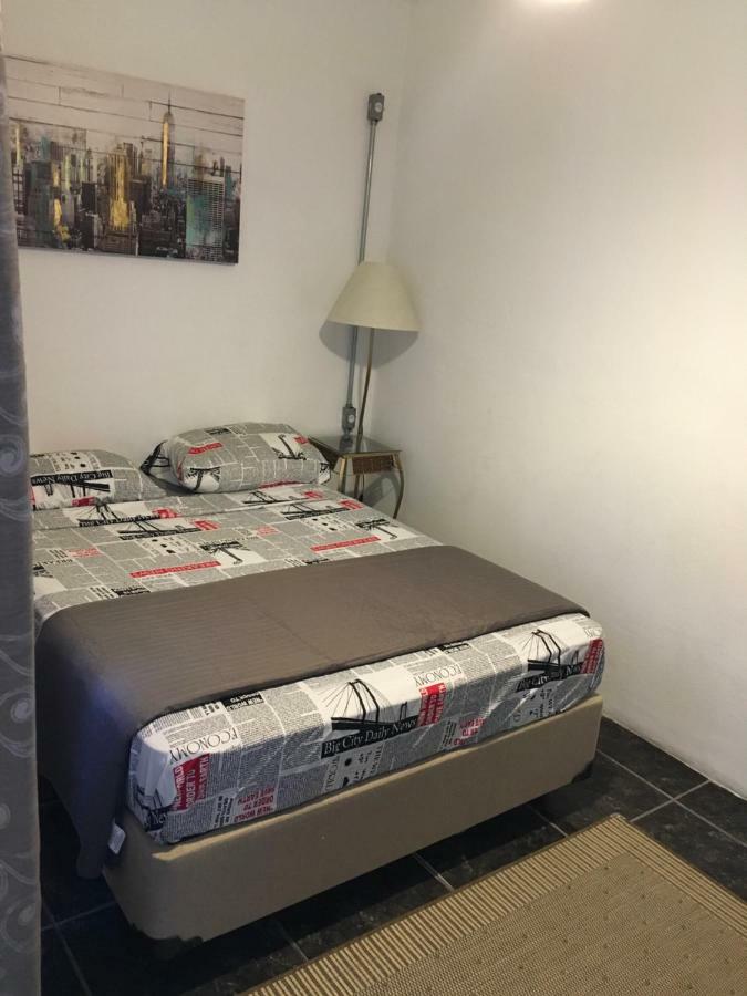 Quarto Quádruplo com Banheiro Compartilhado