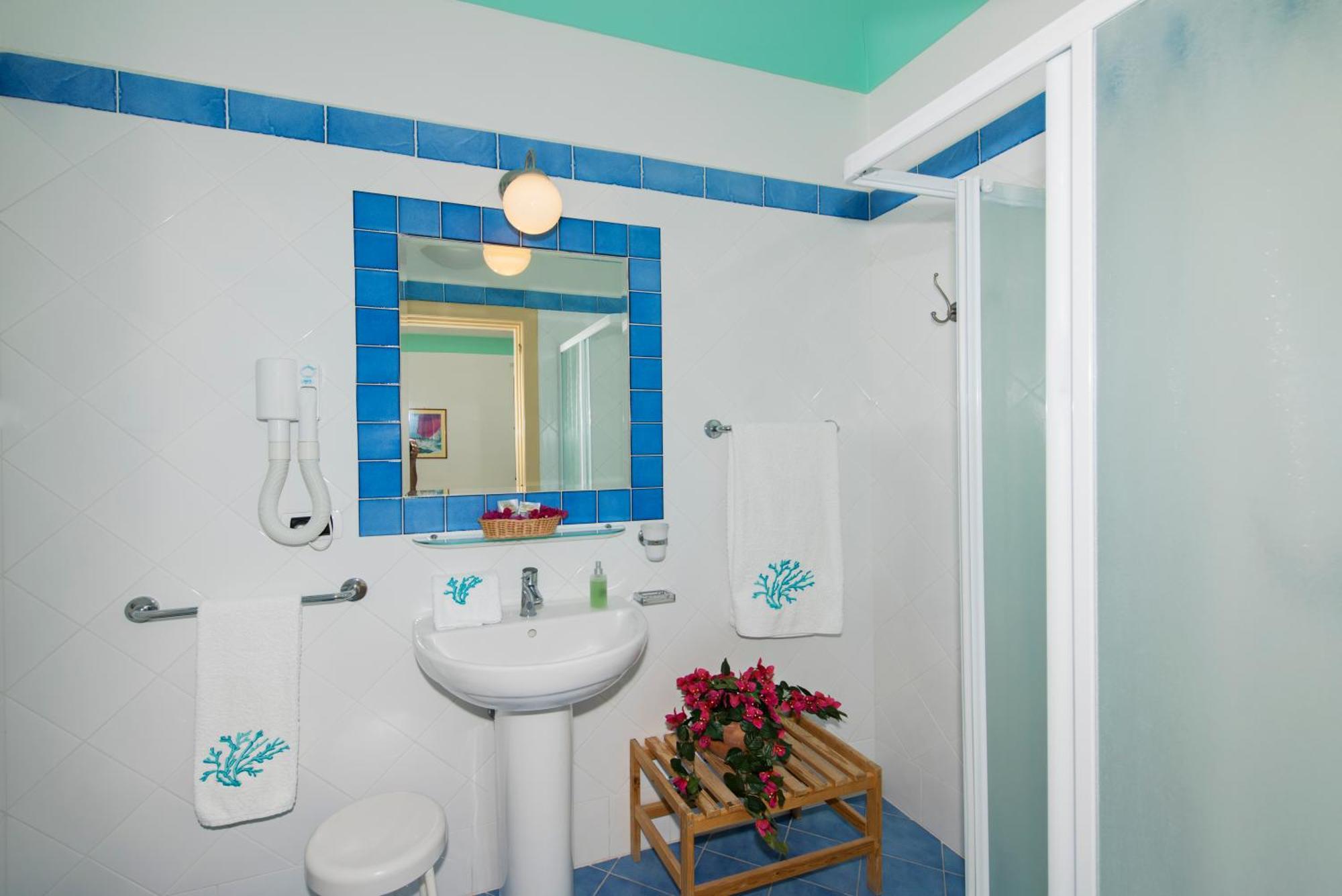 Chambre Quadruple Deluxe avec Terrasse - Vue sur Mer