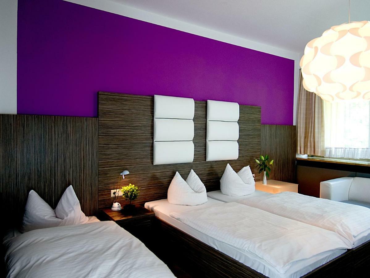 Dreibettzimmer mit Balkon