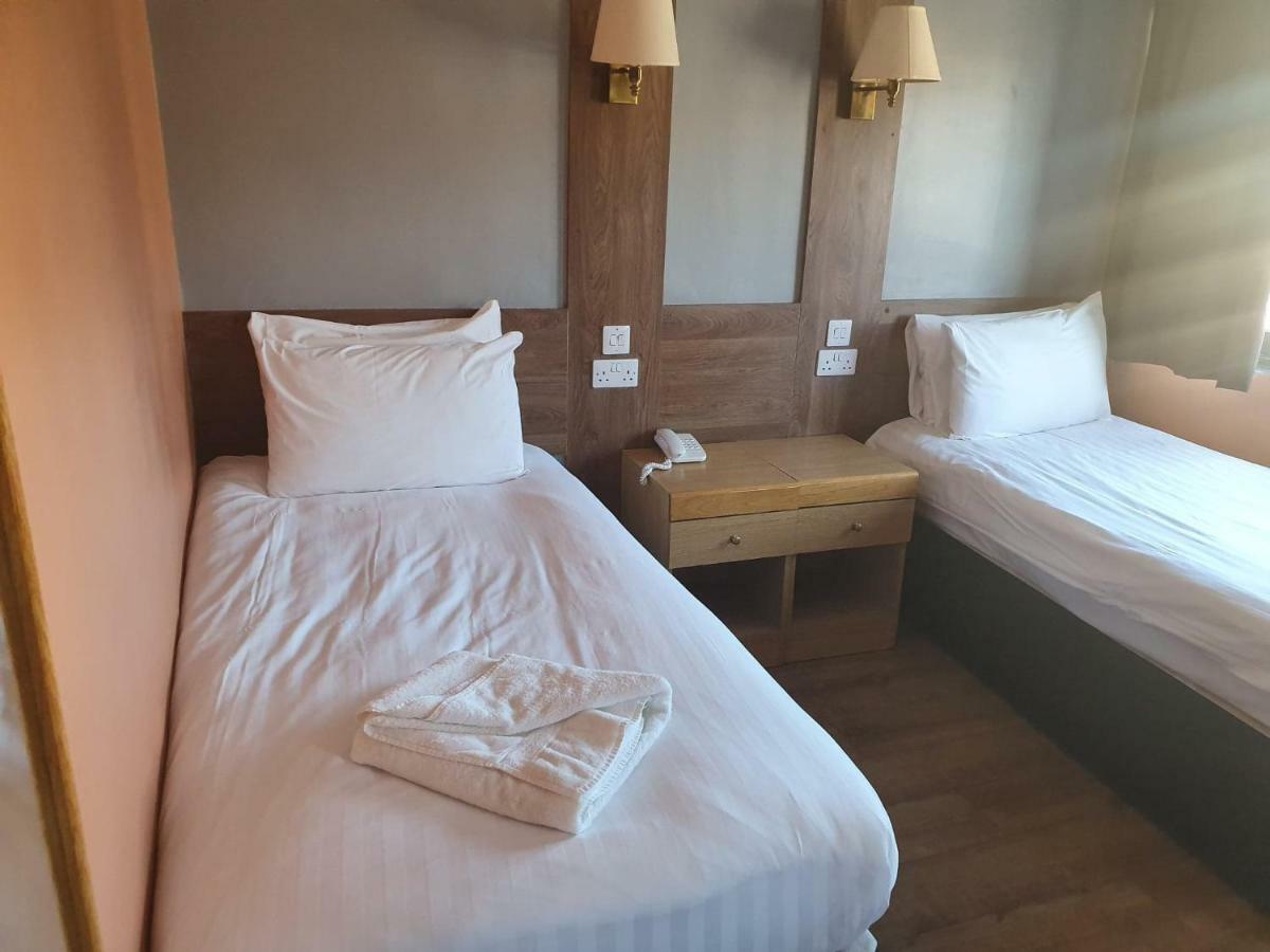 Tweepersoonskamer met 2 Aparte Bedden