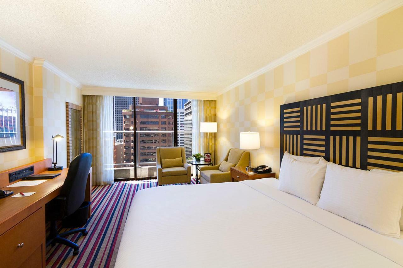 Quarto com Cama King-size e Vista da Cidade