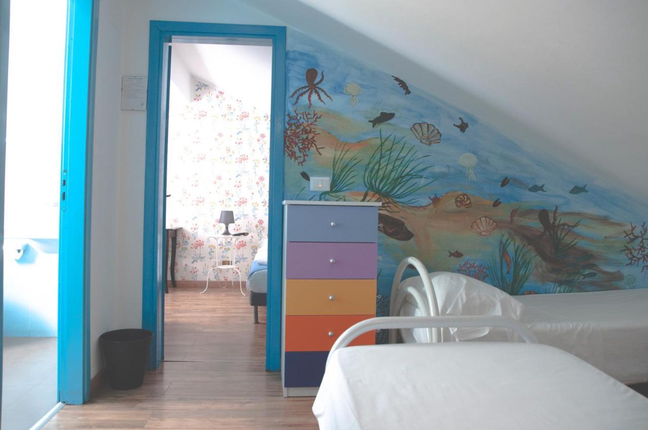 Quadruple Room with Private Bathroom and Balcony