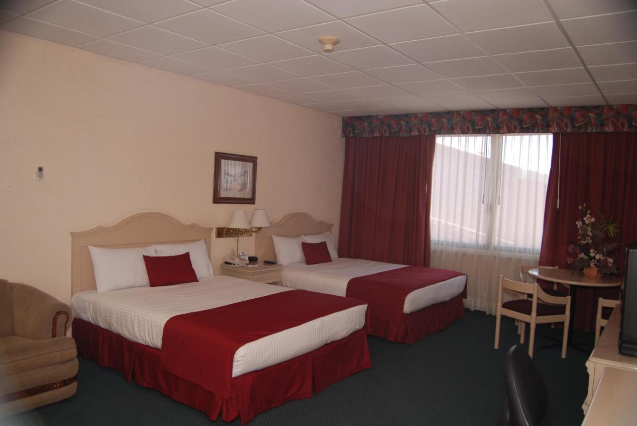 Chambre Triple - Vue sur Ville - Non-Fumeurs