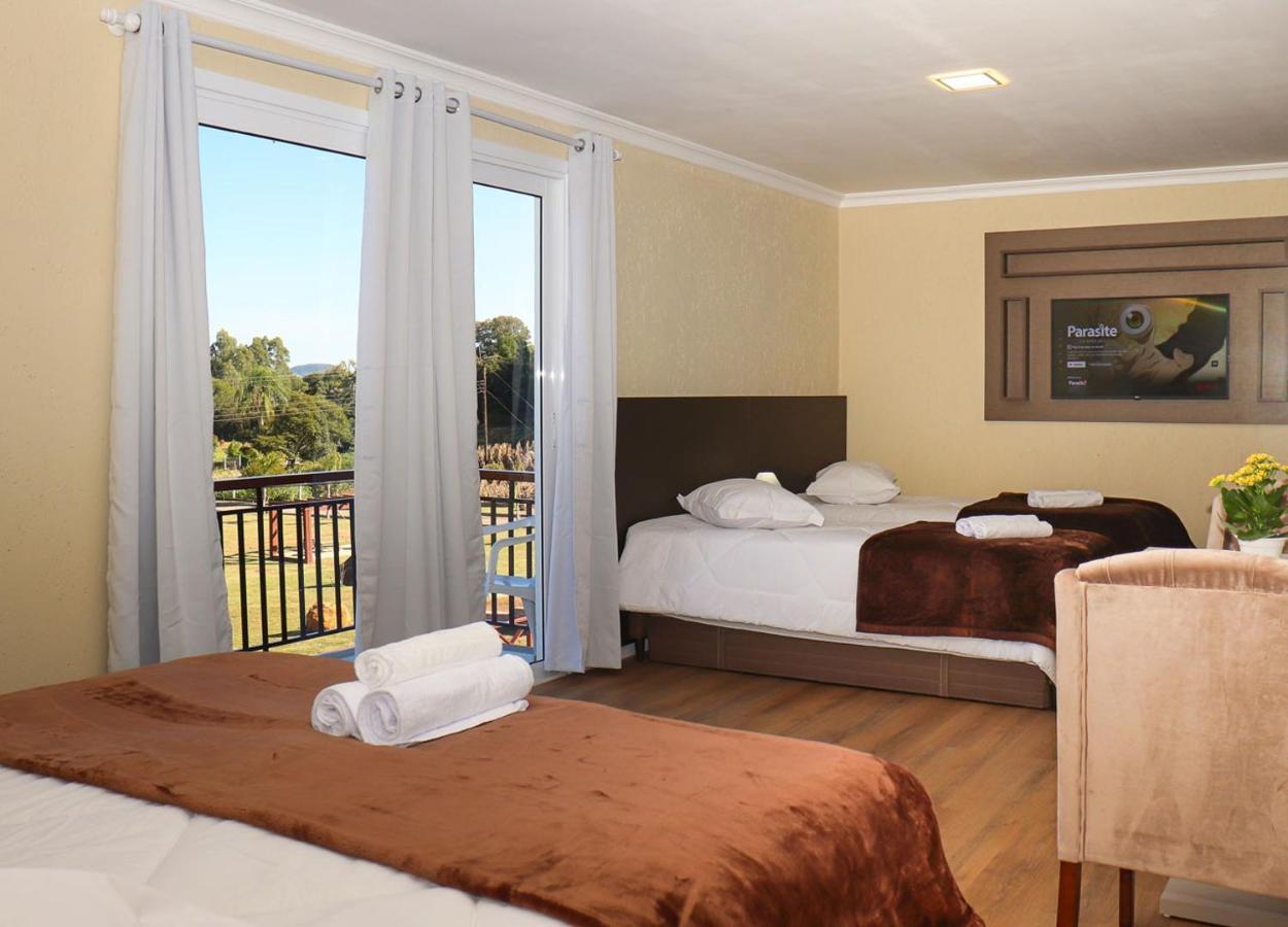 Quarto Quádruplo com Varanda