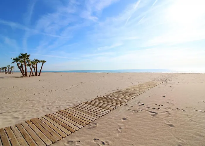 Global Properties, Adosado en la playa de Canet d'en Berenguer